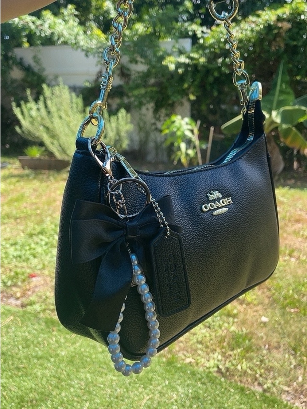 Coach Black Leather Shoulder Bag with Bow Accent